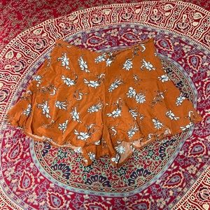 Floral orange shorts. Size M.